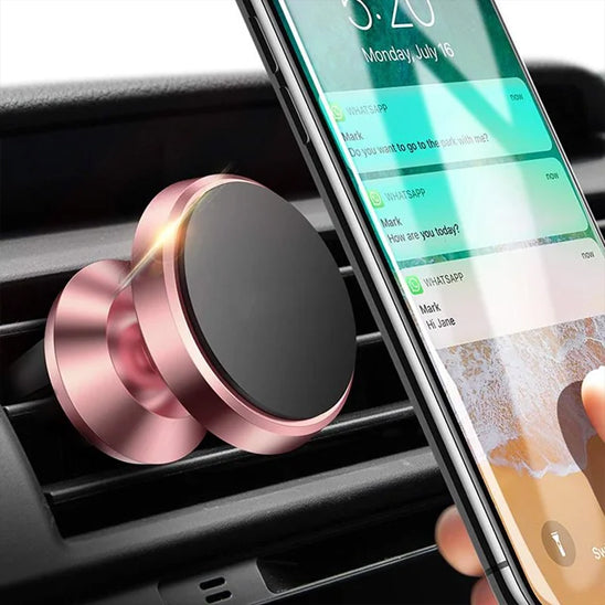 Support de téléphone pour voiture rose en gros plan, avec finition brillante et téléphone fixé solidement
