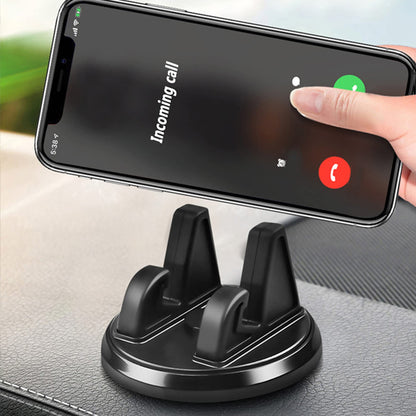 Support de téléphone voiture noir fixé sur le tableau de bord d’une voiture moderne.
